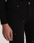 Jeans Flare con Borchie Cuore Mimi Muá