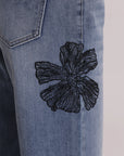 Jeans con Ricamo Floreale Mimi Muà